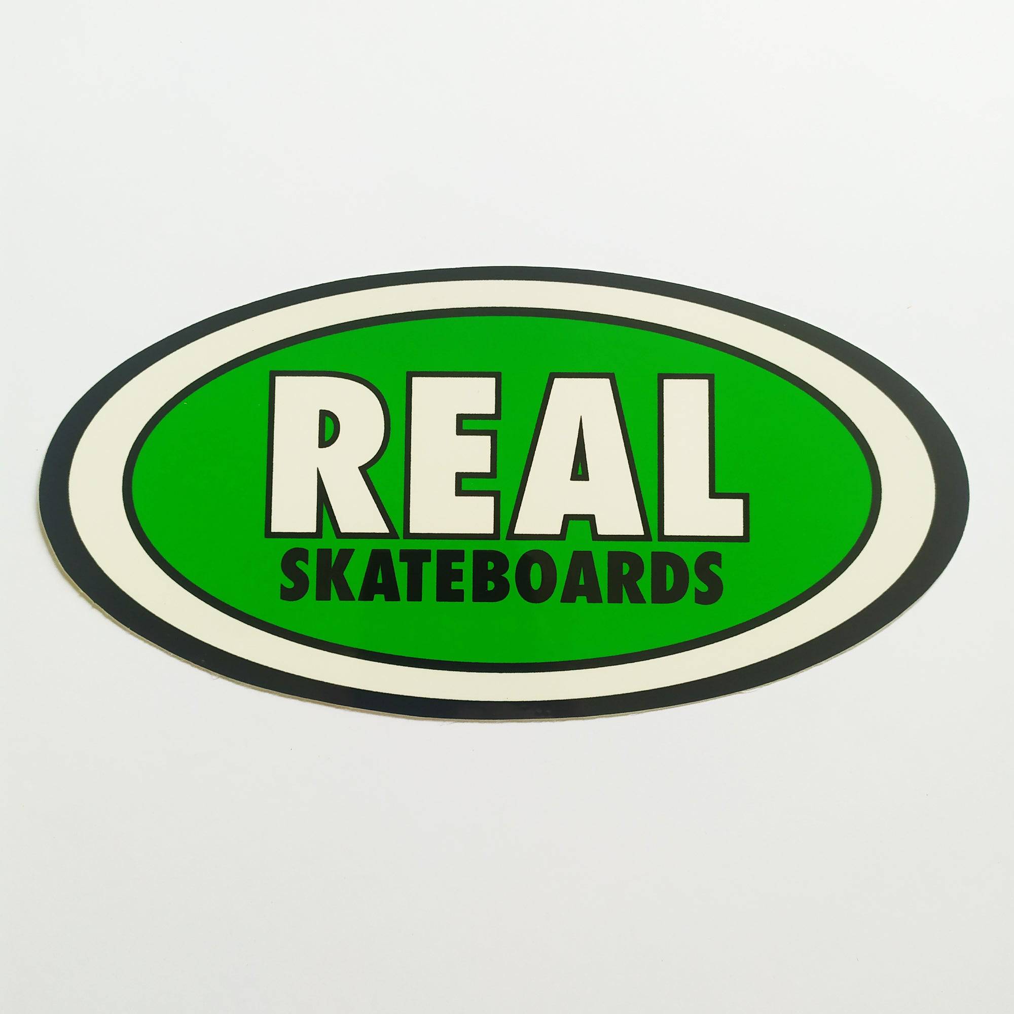 Real Skateboards Oval Sticker - green small - SkateboardStickers.com