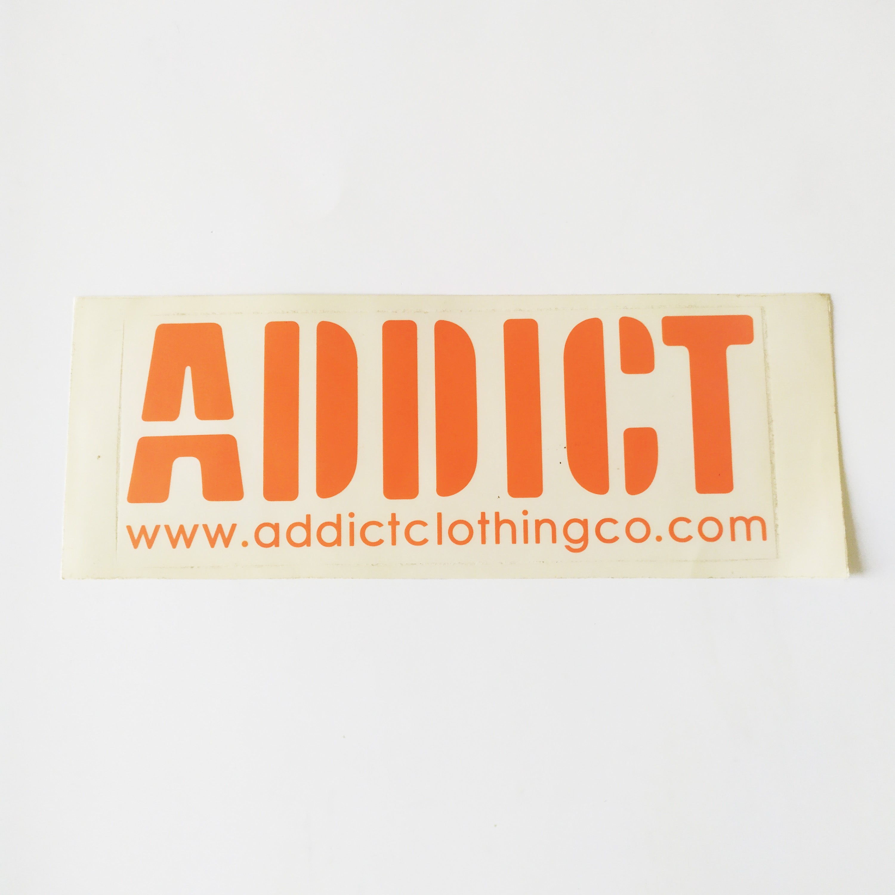 Addict Skateboard Sticker Orange Logo - 17cm across approx - SkateboardStickers.com