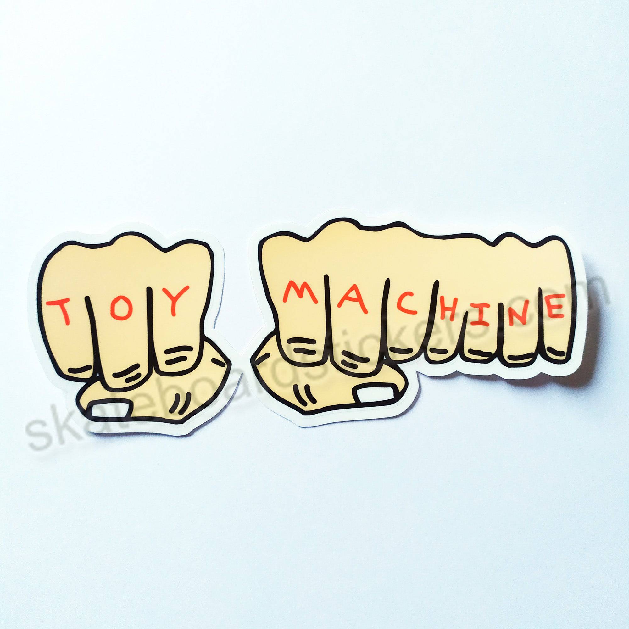 Toy Machine "Fists" - Skateboard Sticker 15.5 cm x 6 cm across approx. - SkateboardStickers.com
