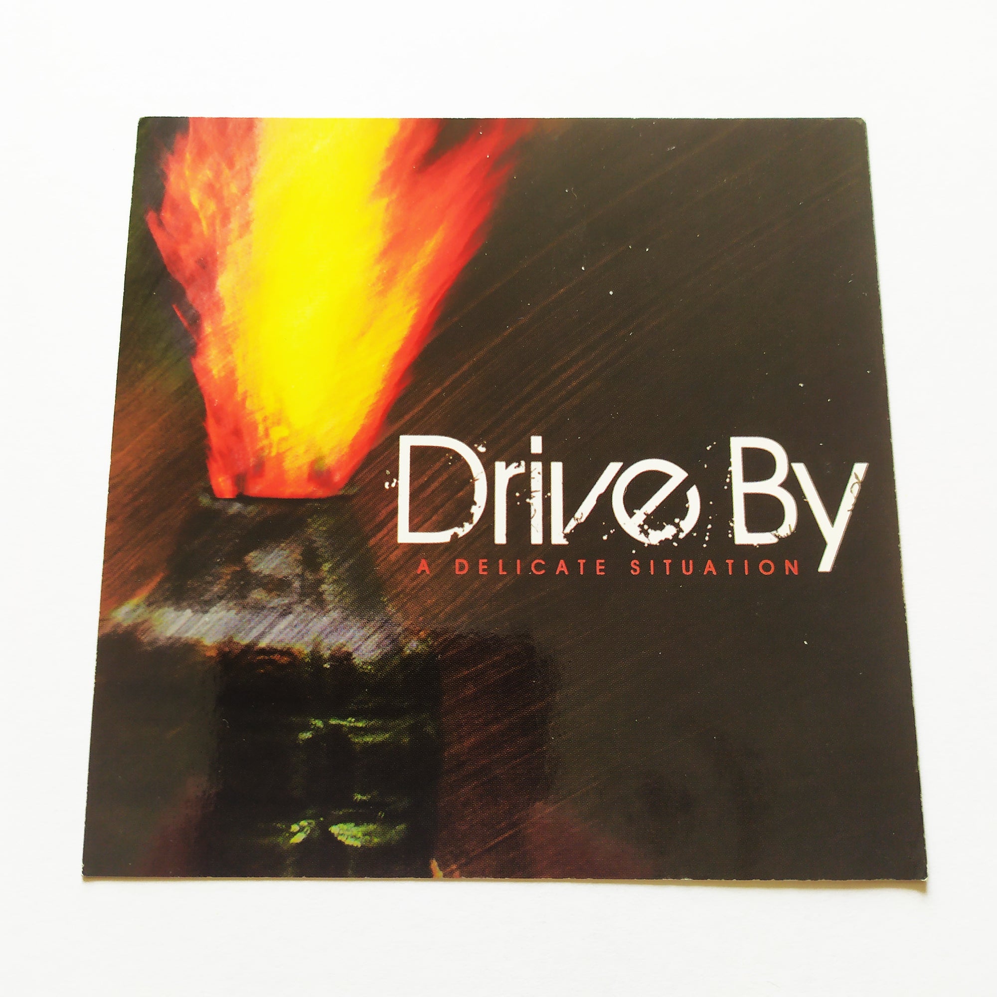 Drive By - A Delicate Situation Music Sticker - SkateboardStickers.com