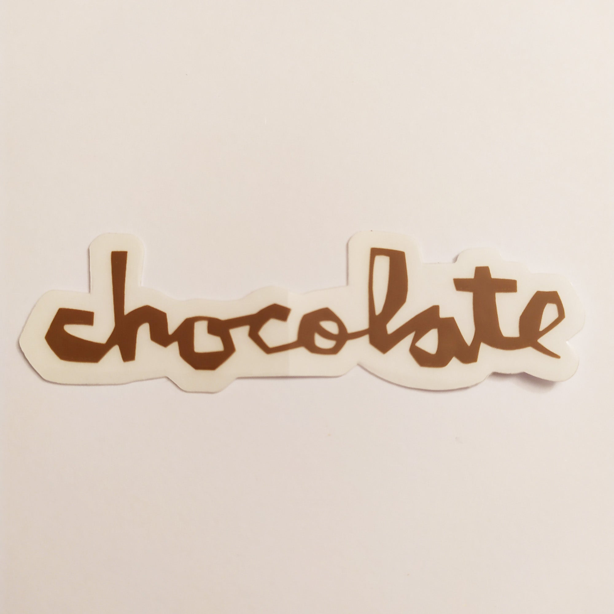 Chocolate Chunk Logo Skateboard Sticker - Brown - 14 cm across approx. - SkateboardStickers.com