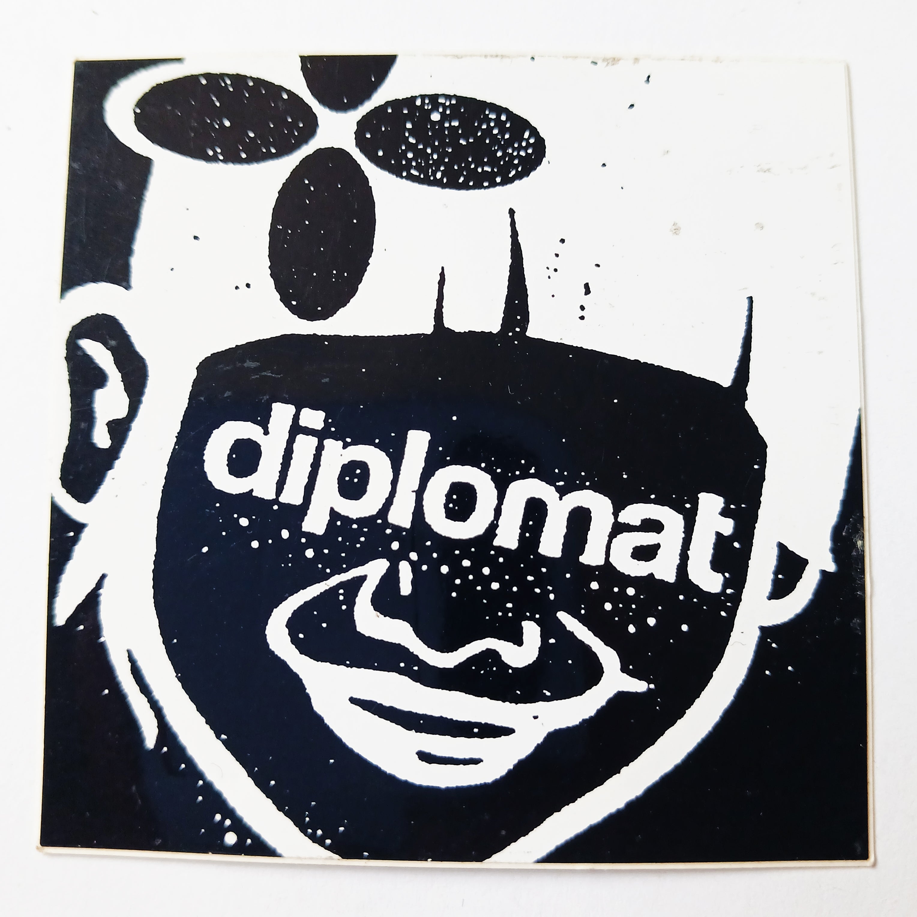 Diplomat Face Skateboard Sticker