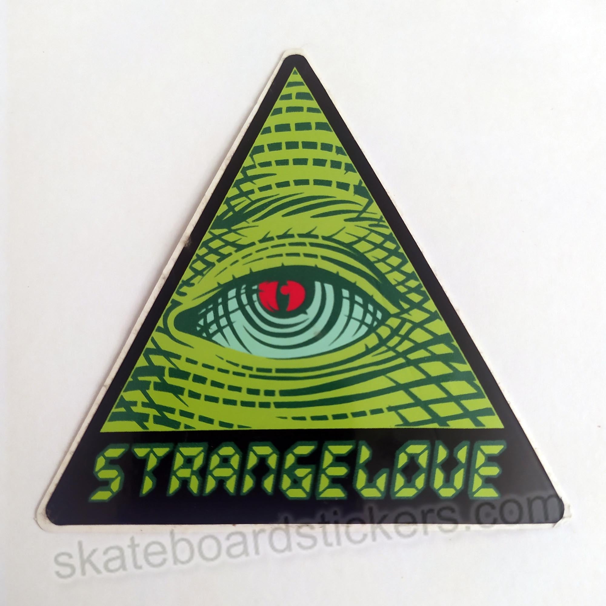 StrangeLove "Green Eye" Skateboard Sticker - SkateboardStickers.com