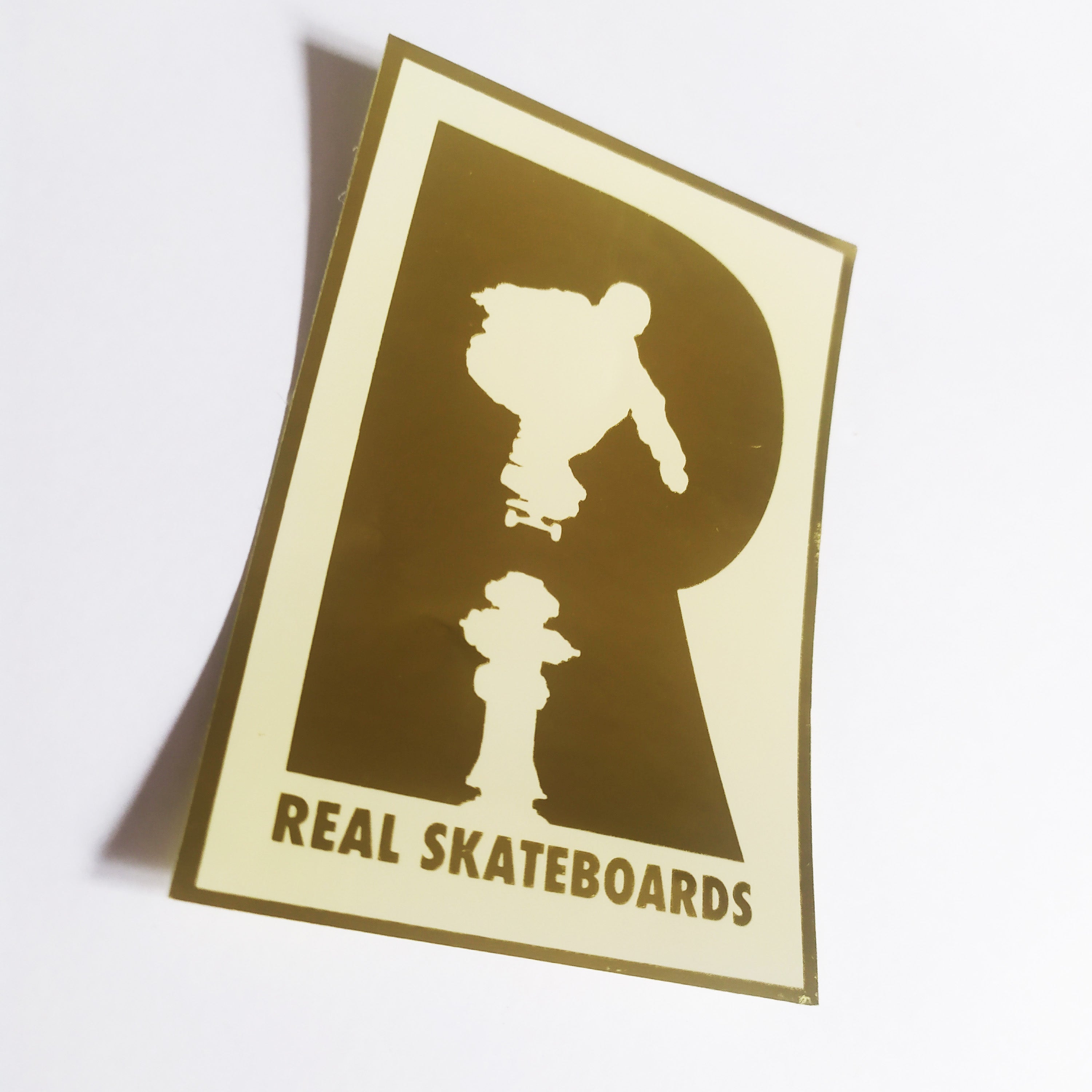 Real Skateboards Logo Foil Sticker - White/Gold