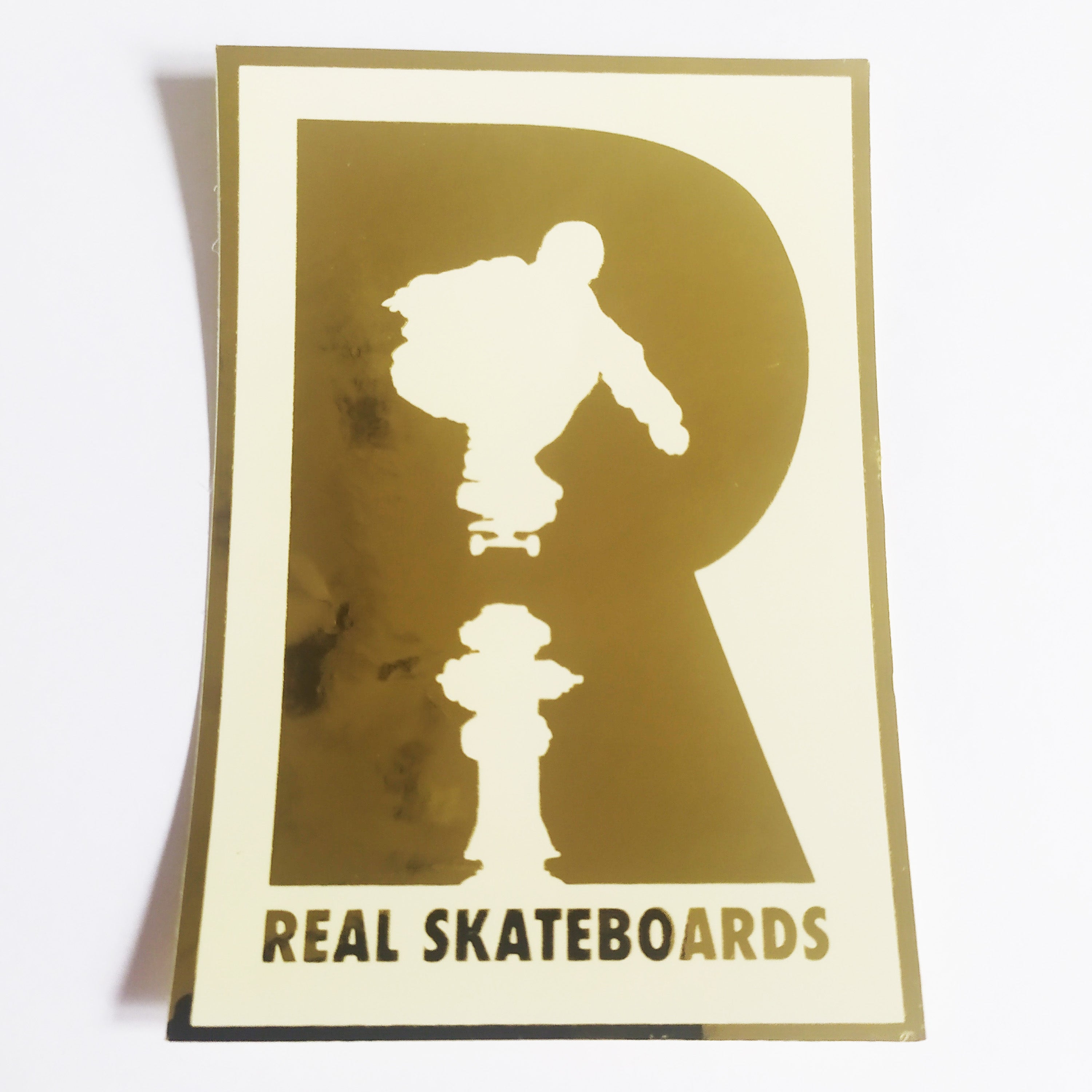 Real Skateboards Logo Foil Sticker - White/Gold