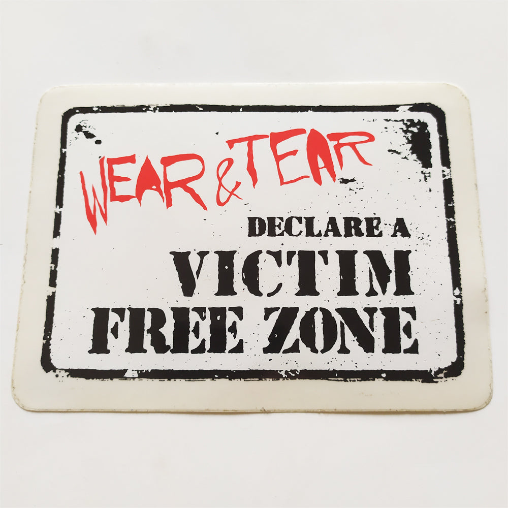 Wear and Tear Skateboard Sticker - Victim Free Zone - 13cm across approx - SkateboardStickers.com