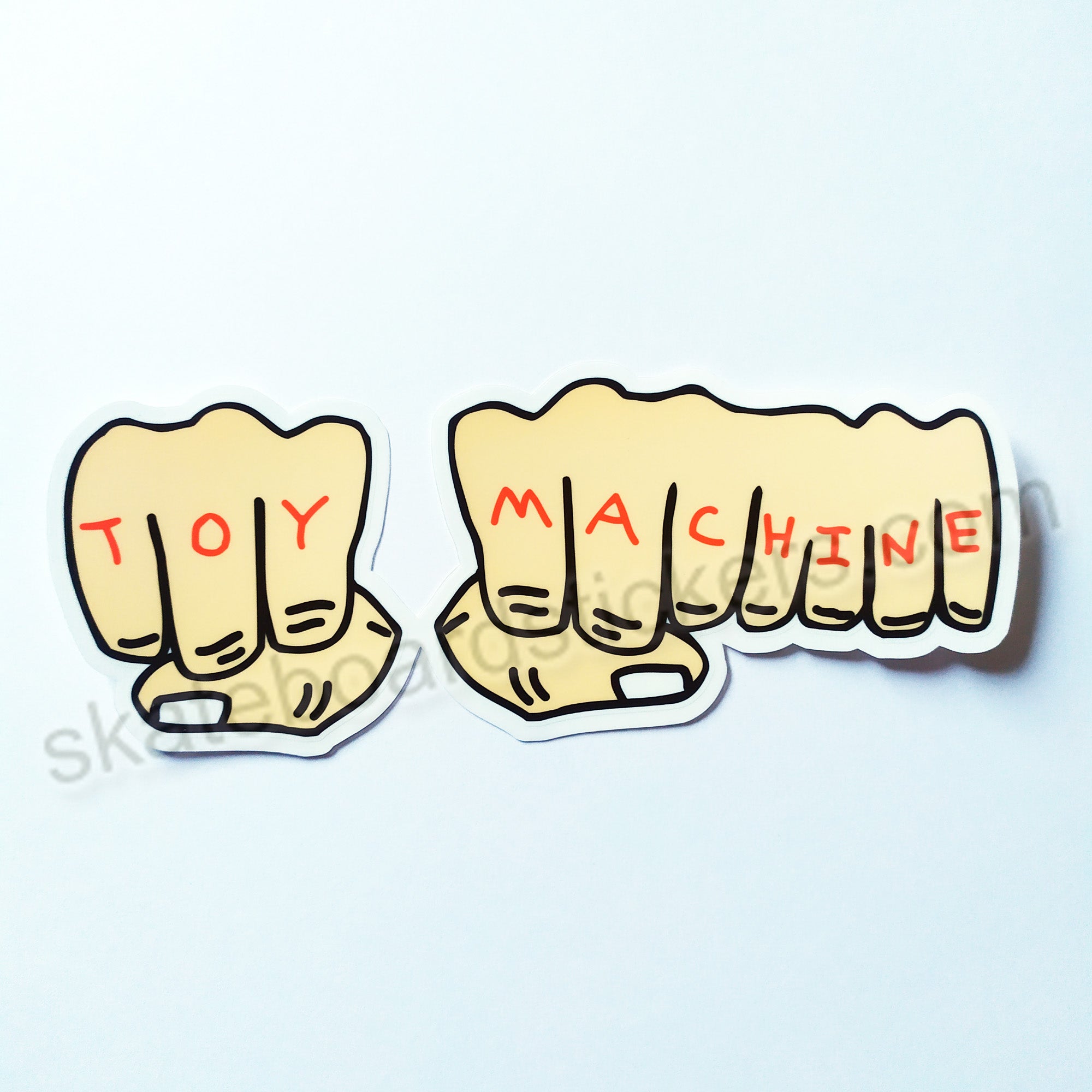 Toy Machine "Fists" - Skateboard Sticker 15.5 cm x 6 cm across approx. - SkateboardStickers.com
